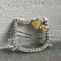 Fermaglio Hello Kitty con strass e cuori