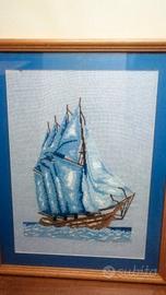 Quadri ricamati a punto croce con cornice
