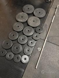 Bilanciere e dischi palestra