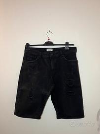 Jeans neri strappati vintage
