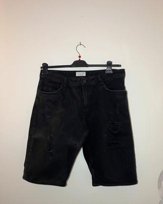 Jeans neri strappati vintage