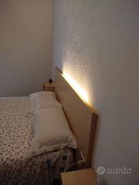 Testiera letto e due comodini pensili
