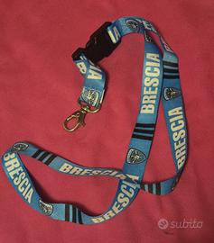 portachiavi e/o badge da collo e/o da tasca