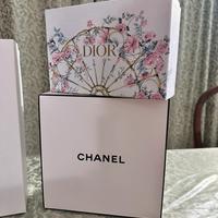 Scatole e buste dior, moschino, chanel e louis v.