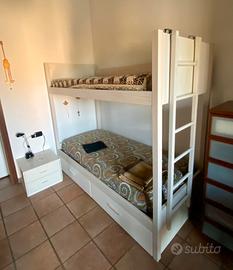 Letto a castello con cassettoni