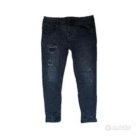 Jeans neri strappati