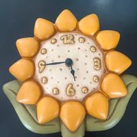 Orologio da parete Thun a forma di girasole