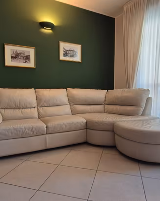 Divano angolare Divani&Divani by Natuzzi + Pouf