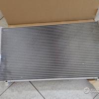 921102y910 condensatore clima nissan maxima/cerifo