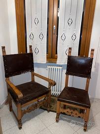 Coppia di poltrone in legno e cuoio