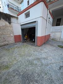 Box auto soppalcato in pieno centro