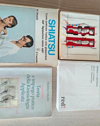 vari libri: rolfing, kinesiologia, shiatsu..