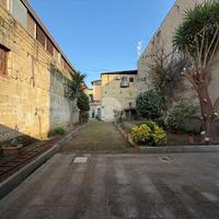 Trilocale con giardino