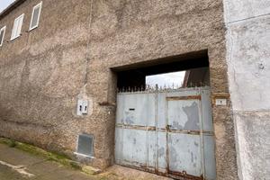 Casa bifamiliare con entrata in comune