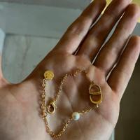 Bracciale Petit CD color oro e perla