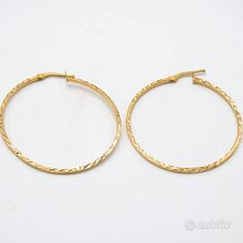 Orecchini a cerchio in oro giallo 18 kt A.149