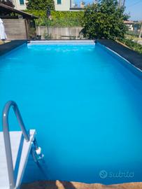 Casa giardino e piscina