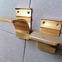 coppia reggimensole in ottone