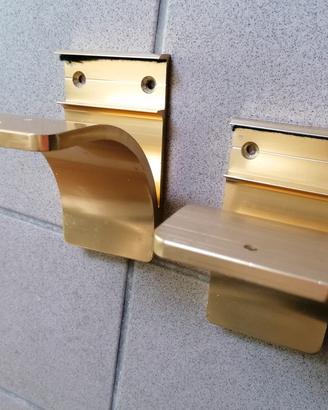 coppia reggimensole in ottone