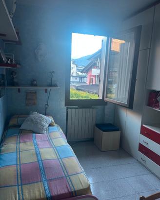 Camera con uso cucina in comune