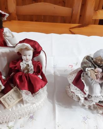 BAMBOLE IN CERAMICA CON DIVANO