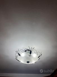 Set di tre lampadari in ferro battuto e vetro