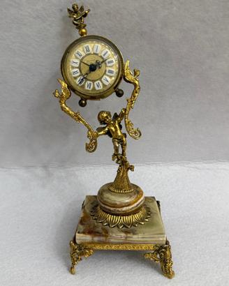 Antico orologio da tavolo