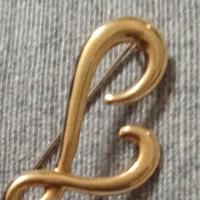 Spilla in oro 750,lettera L