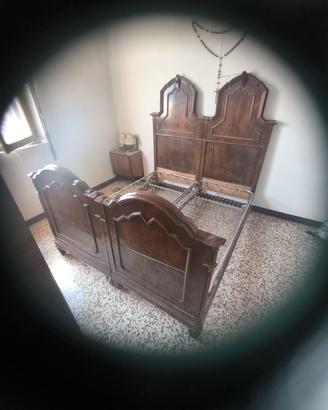 letto in legno massiccio con reti
