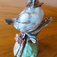 Statuina vintage uccellino su ramo