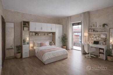 Camera arredata in appartamento condiviso