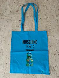 Borsa Moschino in cotone per lancio nuovo profumo