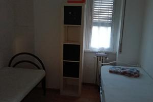 Camera posto letto donna