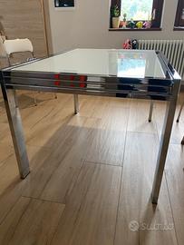 Tavolo allungabile  in cristallo e cromature