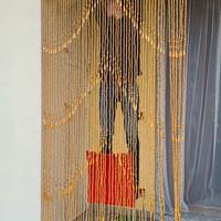 Tenda a perline in legno