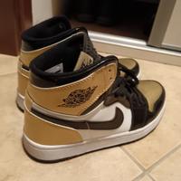 Scarpe Air Jordan 1 Gold.