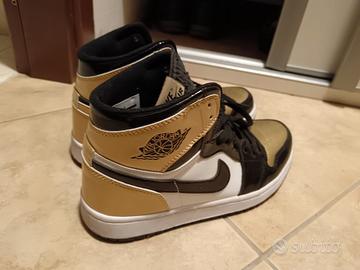 Scarpe Air Jordan 1 Gold.