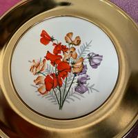 4 piatti decorativi motivo fiori