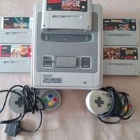 super nintendo con 5 giochi e due joystick