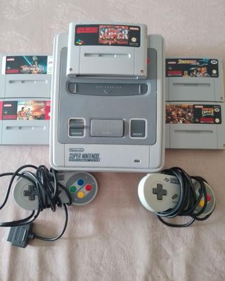 super nintendo con 5 giochi e due joystick