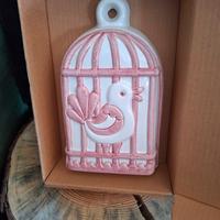 Thun uccellino in gabbia