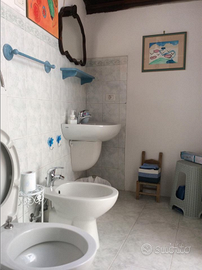 Camera con bagno esterno