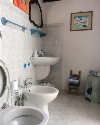 Camera con bagno esterno