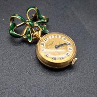 Orologino da donna antico in oro e smalti