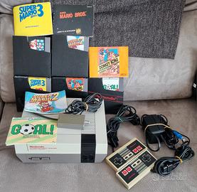 Nintendo Nes 001 + 2 Joystick + 4 giochi 