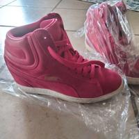 Scarpe della Puma Rosa