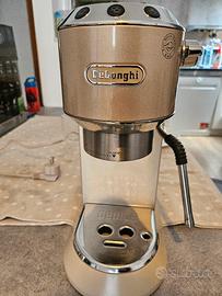 macchina del caffe Delonghi color oro