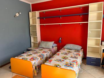 Letti singoli con materassi