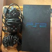 Ps2 nera funzionante con cavi, joystick e memory