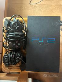 Ps2 nera funzionante con cavi, joystick e memory
